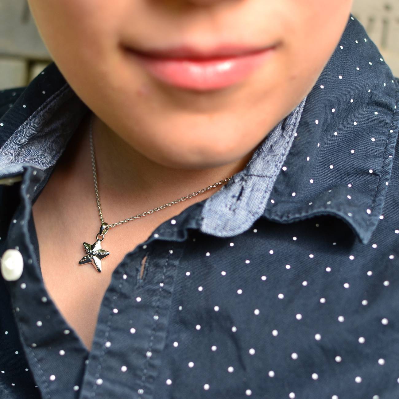 Boy wearing Children's Silver Starfish with Smile Pendant on an Extendable Chain Necklace
