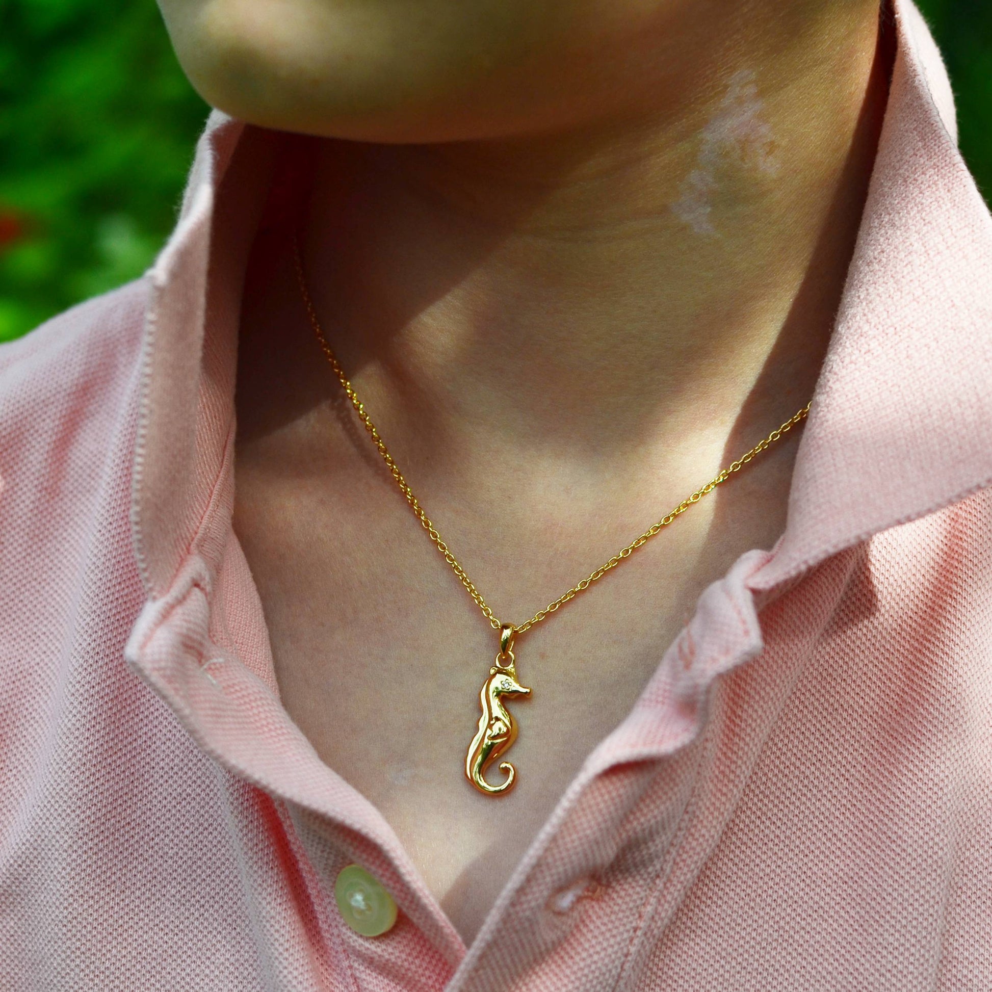 Boy wearing Gold Seahorse with Diamond Eye Pendant on an Extendable Chain Necklace