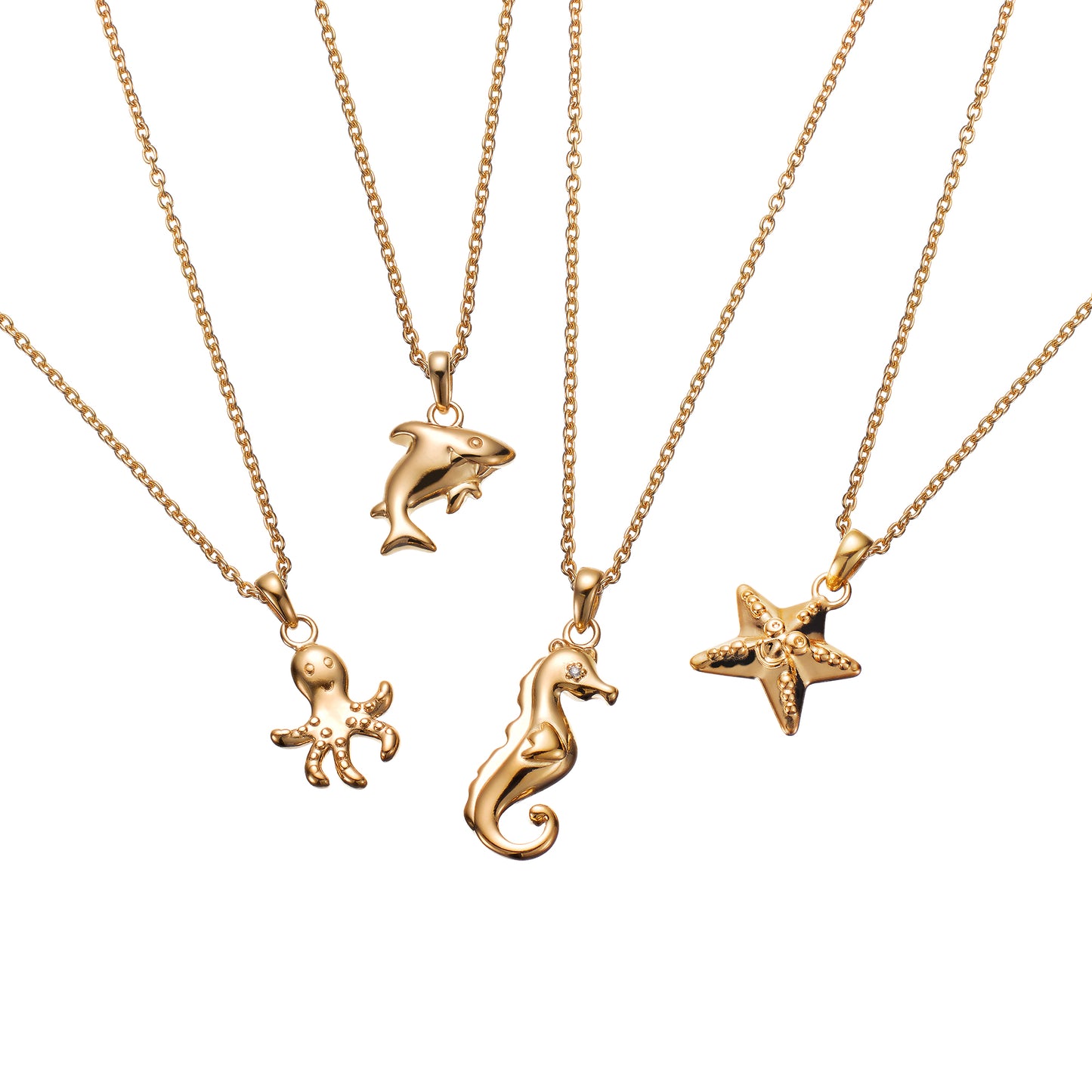Under the Sea collection of gold children's necklaces including octopus. shark, seahorse and starfish, all on Extendable Chain Necklaces
